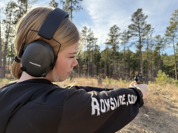 Daughter trying out the Vortex Defender CCW